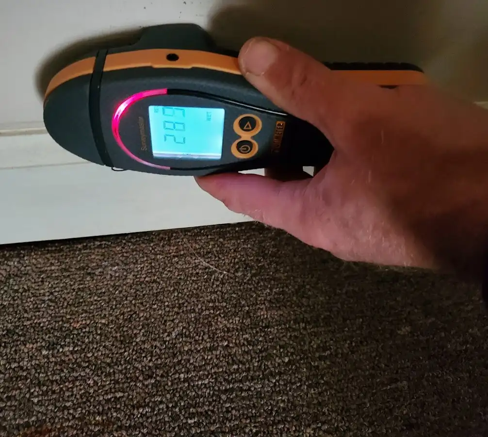 Moisture detection at baseboard during Burst Pipe Cleanup in Southlake
